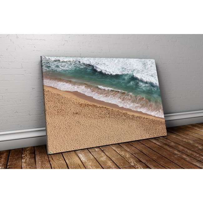 Lábnyomok a parton - 75x50 - Vászonkép